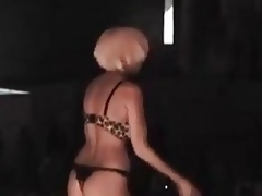 Busty blond babe Puma Swede flashing her curvy body in the crowd