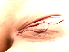 Blonde gal fingering her bush